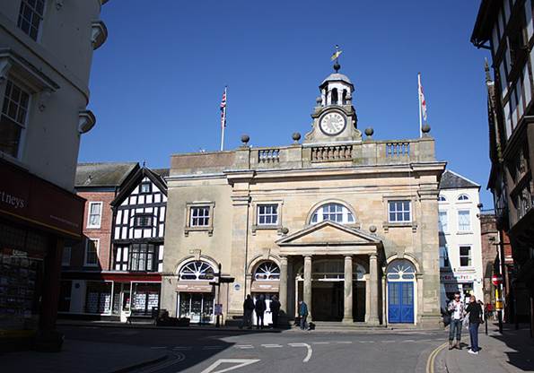 A building with a clock on top

AI-generated content may be incorrect.